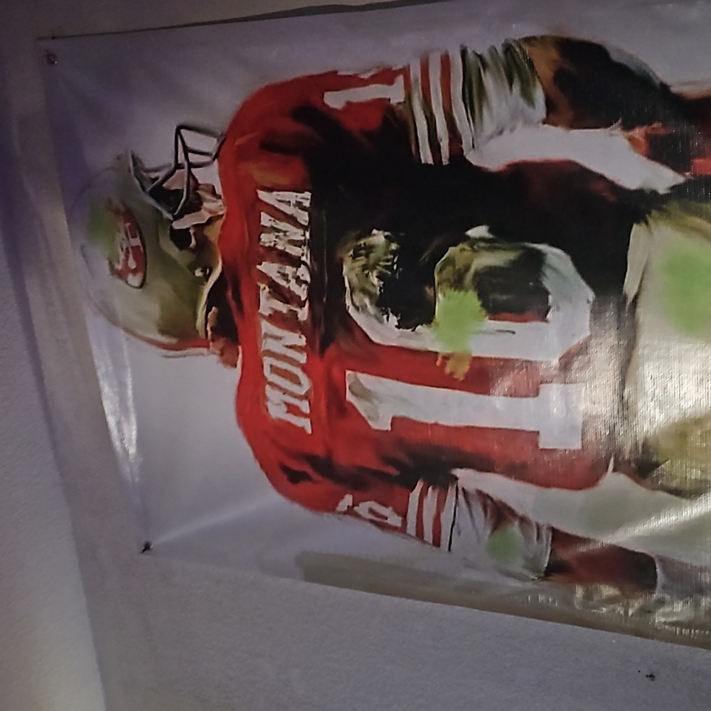 SF49ER Joe Montana banner. Herd to find item.